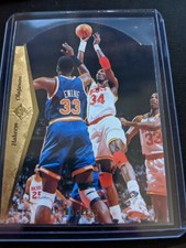Hakeem Olajuwon 1994-95 Upper Deck SP Die-Cut #D76 with Patrick Ewing