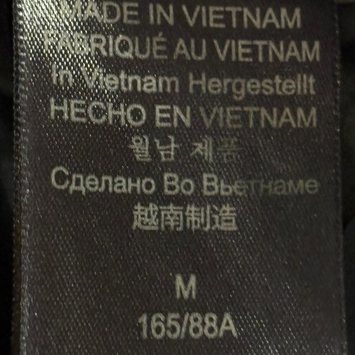 Impermeable para mujer Marmot mediano negro cremallera completa y broches magnéticos capucha cuello alto - Imagen 6 de 9