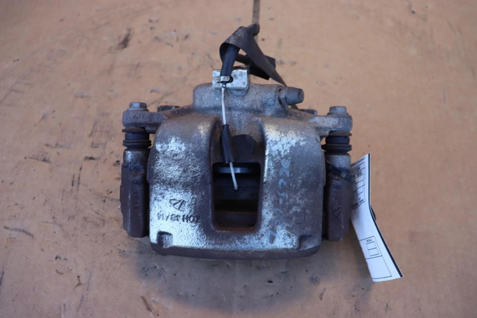 Pinza de freno trasera izquierda Dodge Ram Promaster 1500 2014-2021 tracción delantera OEM Foto 2 de 4