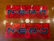 N.E.R.D.   Stickers (set of 2 ) ￼ 9x3” + ￼ Free flag sticker
