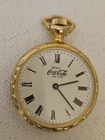 COCA COLA POCKET WATCH GOLDTONE VINTAGE WIND UP ENJOY COCA-COLA TRADE MARK...
