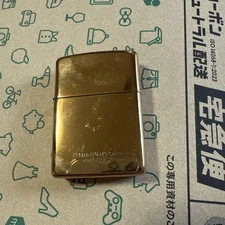Titanium Gold Zippo Lighter with Armor Case Used