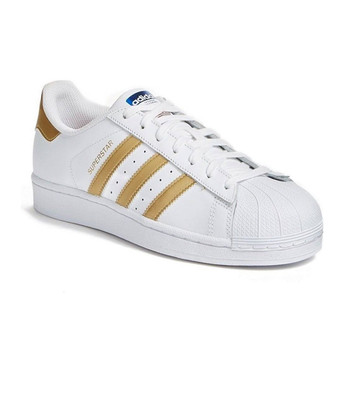 white adidas shoes with gold stripes
