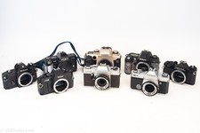 Lot of 8 Vintage 35mm SLR Film Cameras Topcon Canon Nikon AS-IS Parts Repair V27