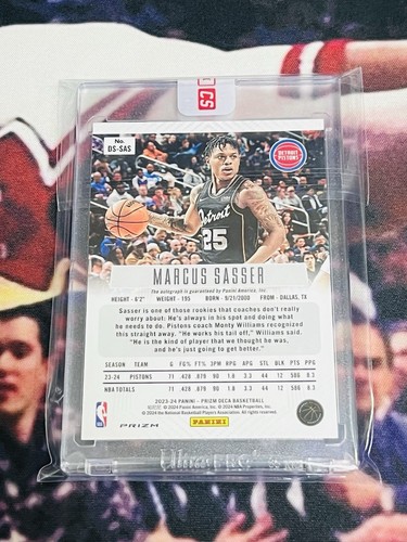2023-24 Panini Prizm Deca Marcus Sasser Verde Brillo/25 Automático Novato RC Sellado - Imagen 2 de 3