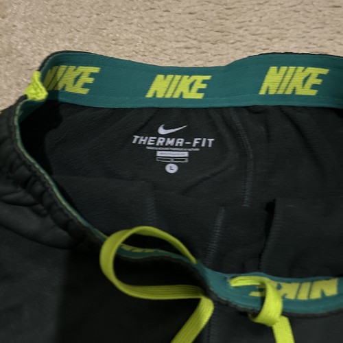 Pantaloni sportivi Nike Therma-Fit NERI VOLT NEON taglia UOMO fondo corda grande - Foto 17 di 24