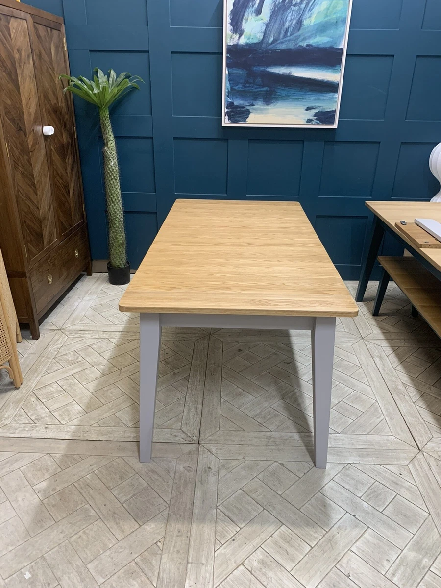 Extendable dining 2024 table with drawers