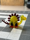 Cute little plastic dinosaur toy yellow translucent stegosaurus 3 inch