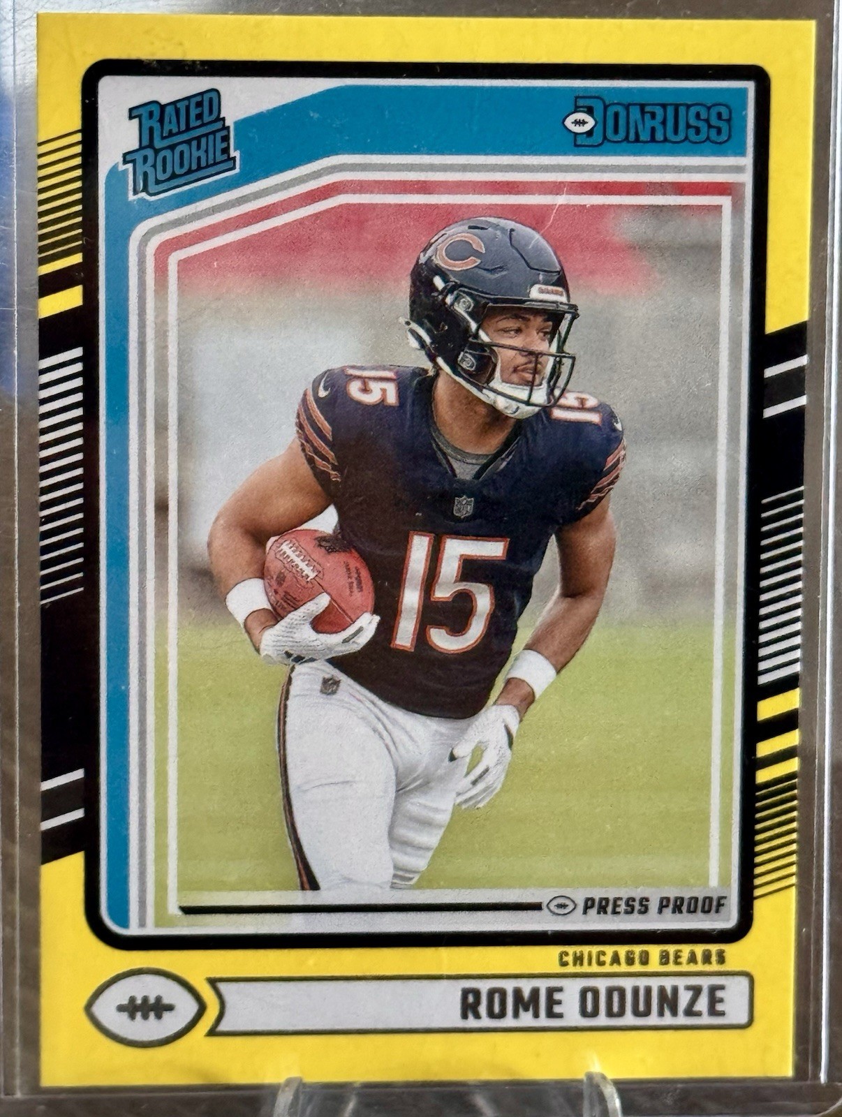 2024 Panini Donruss - Rated Rookie Rome Odunze #309 Press Proof Yellow (RC)