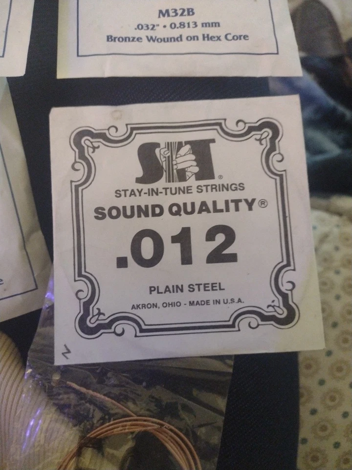 Juego de 6 cuerdas para guitarra acústica vintage MARTIN calibre medio nos Foto 2 de 4