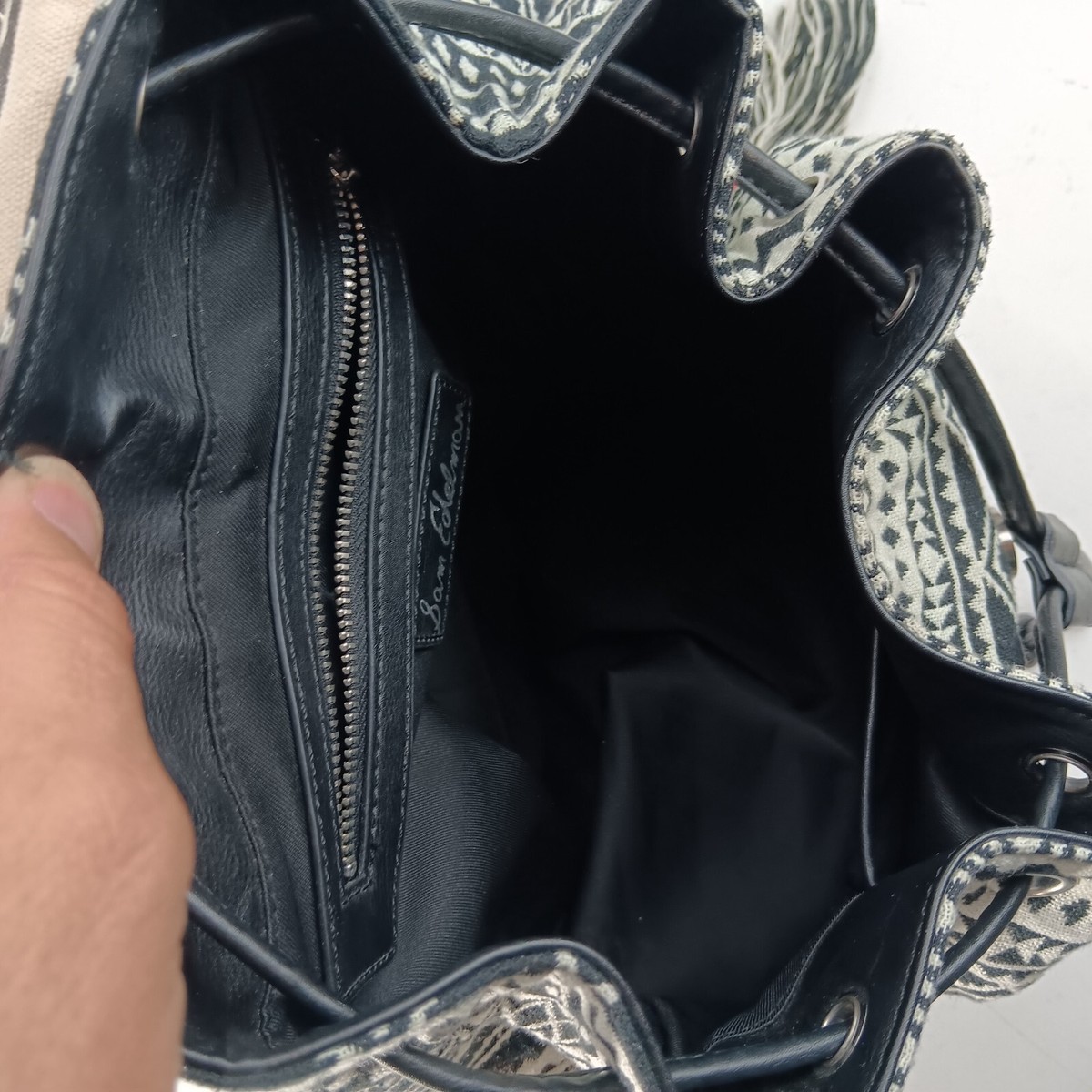 ? Sam Edelman Black Pebbled Leather Backpack SAM EDELMAN Leather/Woven Textile Embroidered Cinch Backpack  main image 2
