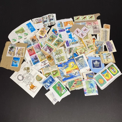 Worldwide Mix 1-oz (28 gm) KILOWARE Stamps On Paper. Stamps Are As Shown