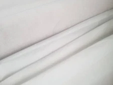 White 100% Cotton Organdy, this fabric is stiff semi sheer fabric