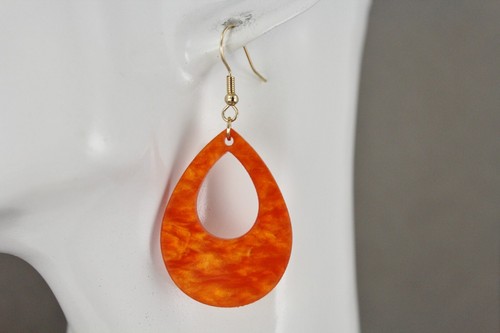 Orange teardrop earrings lightweight dangle cut out oval outline 2.25" long