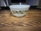 Pyrex Spring Blossom or Crazy Daisy white mixing bowl, model #402.