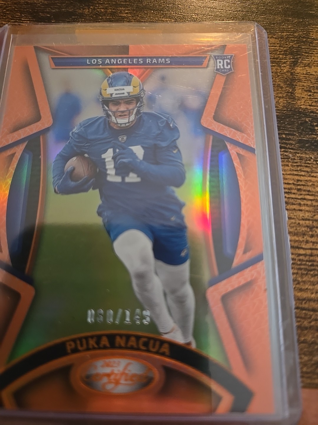 2023 Panini Certified - Rookies Puka Nacua #143 Mirror Orange /149 (RC)