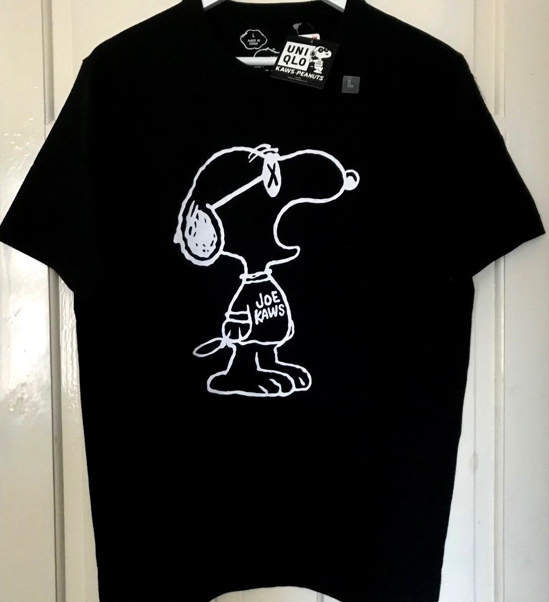 Rare New + Tags Limited Edition UNIQLO UT KAWS X PEANUTS Snoopy Designer T Shirt Rare New + Tags Limited Edition UNIQLO UT KAWS X PEANUTS Snoopy Designer T Shirt