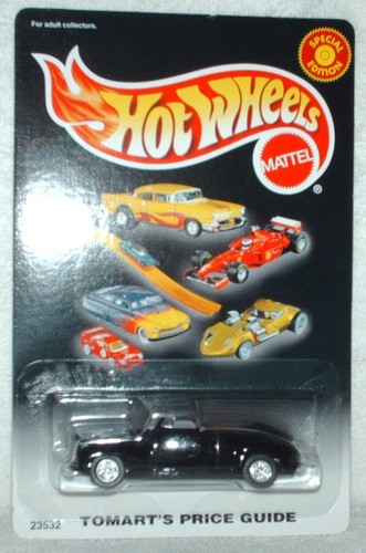 Hot Wheels 2001 Tomart's Price Guide 1946 Ford Convertible black,real riders