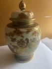 A KOSHIDA SATSUMA GINGER JAR AND COVER, MEIJI PERIOD, LATE 19TH CENTURY.
