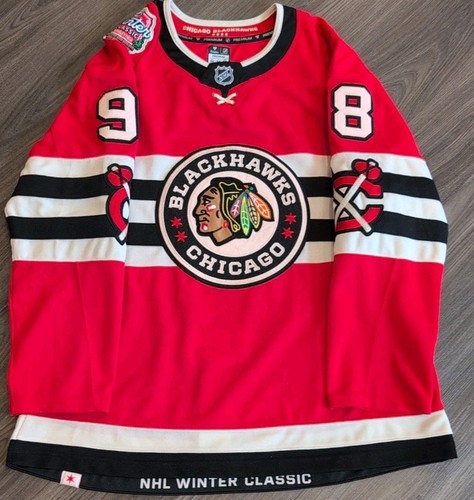 Camiseta deportiva Connor Bedard premium de fanáticos clásicos de invierno de los Chicago Blackhawks 54 LEER