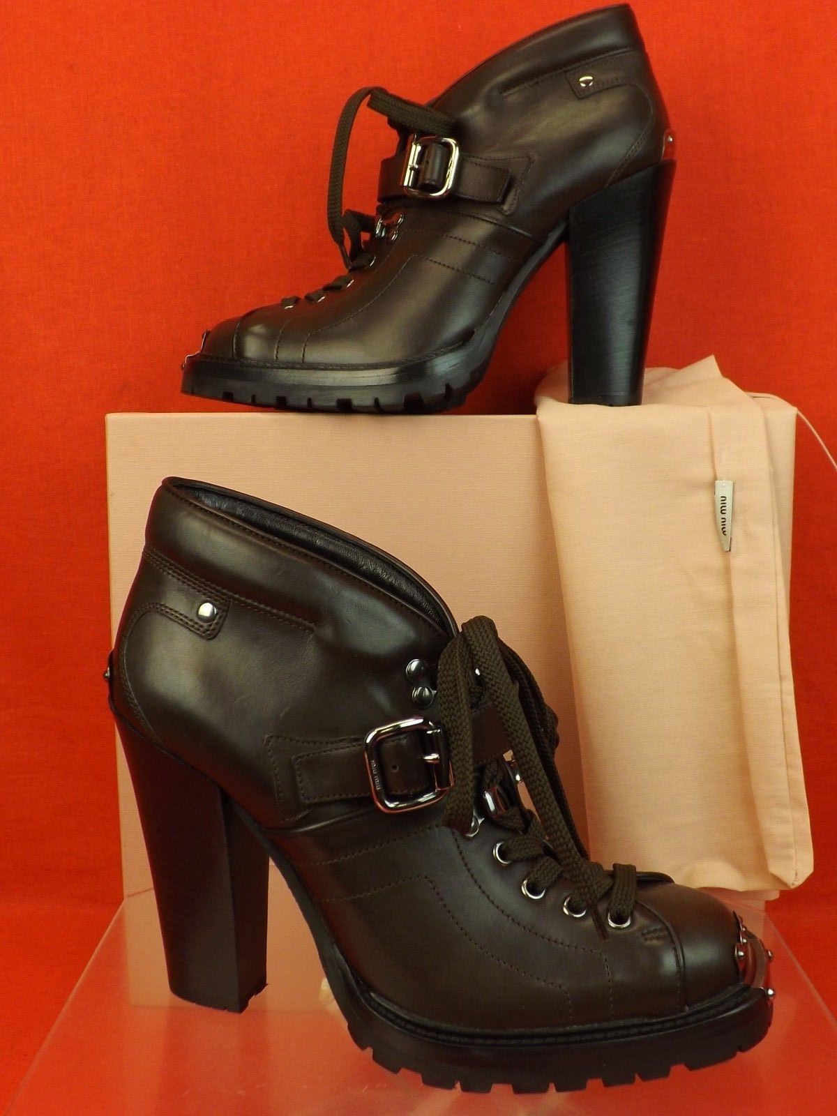 NIB MIU MIU PRADA DARK BROWN LEATHER PLATED BELTED MOTO BIKER BOOTS 40.5 $1K NIB MIU MIU PRADA DARK BROWN LEATHER PLATED BELTED MOTO BIKER BOOTS 40.5 $1K