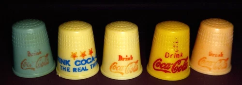 Thimbles 5 plastic vintage Coca Cola Various colors