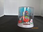 Solar Christmas swinging mouse over Santa's sleigh with presents snowman penguin