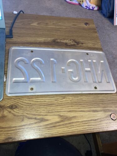 Placa de licencia vintage de Wisconsin America's Dairyland NHG 122 - Imagen 2 de 2