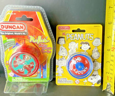 DUNCAN YO YO LOT PEANUTS/SNOOPY REFLEX SEALED BUT PLASTIC DENTS
