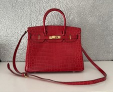 Rote Handtasche aus Leder (Krokodilprägung)