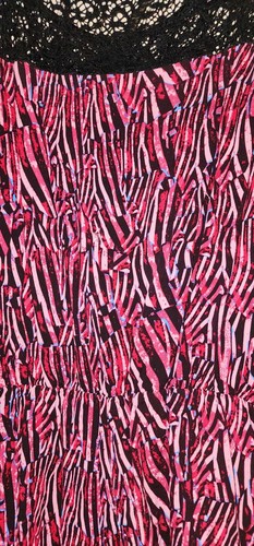 Mameluco rosa intenso con estampado de cebra negro talla M. - Imagen 4 de 4