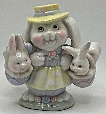 Easter Bunny Holding 2 Baby Bunnies