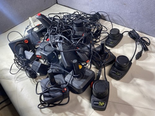 Lot of Atari 2600 Paddles and Joysticks And Misc Lot ! Selling All For One Price