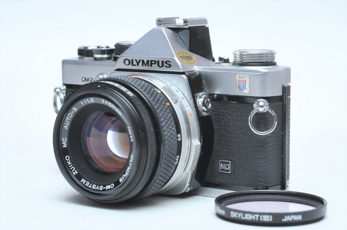Olympus OM-2n 35mm Film Camera W/50mm F1.8 Zuiko Manual Olympus OM-2n 35mm Film Camera W/50mm F1.8 Zuiko Manual