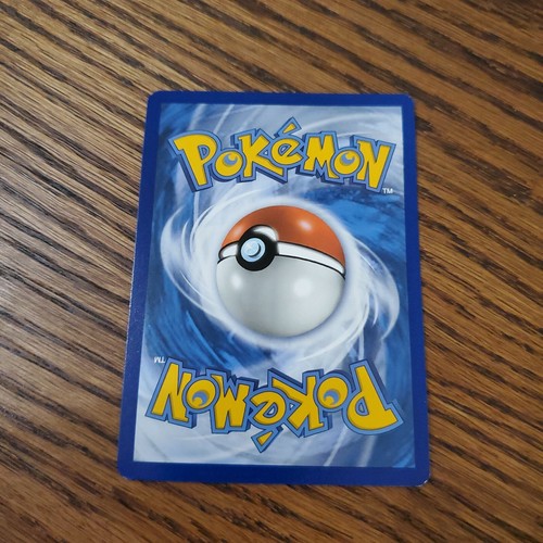 Pokemon TCG Card - Sneasel 85/147 Burning Shadows - Picture 2 of 2