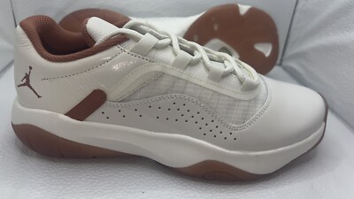 SZ 9.5- WMNS AIR JORDAN 11 CMFT LOW. With a slight odor possibly of smoke,