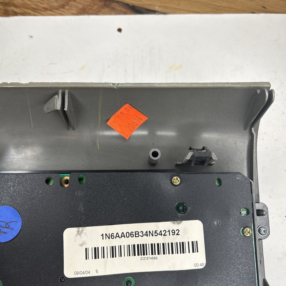 0405 NISSAN ARMADA Radio CD Player Climate Temp Dash Control Panel 280987S215 eBay