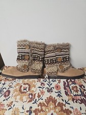 Muk Luks Tan Faux Fur-trimmed boots With Removable Plaid Fabric Accent.