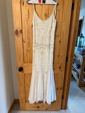 Wedding dress, size 8 BHLDN ivory with beautiful beading/sequins