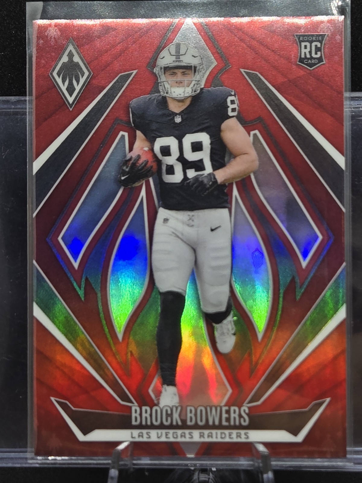 2024 Panini Phoenix - Rookies Brock Bowers #165 Red /99 (RC)