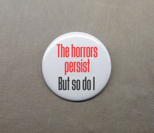 The Horrors Persist but so do I 1.25” Button Defiance and Strength Meme Pinback - 第 1/3 張圖片