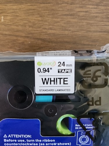 Nastro nero lettera su etichetta bianca - .94" 24mm compatibile con Brother PTouch x1 - Foto 2 di 3