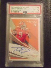 2021 Panini Immaculate Collegiate Travis Etienne Jr. RC Rookie AUTO #44/99 PSA 8