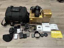 Nikon D300S Digital SLR Camera with 18-200mm VR ED Lens and Accessories Bundle