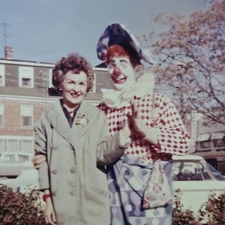 Vintage Color Photo Snapshot of Older Lady Standing w/ Creepy Red Nosed Clown
