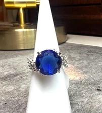 Ring Bomb Party Ring size 6 round blue gemstone CZ type accent stones silver col