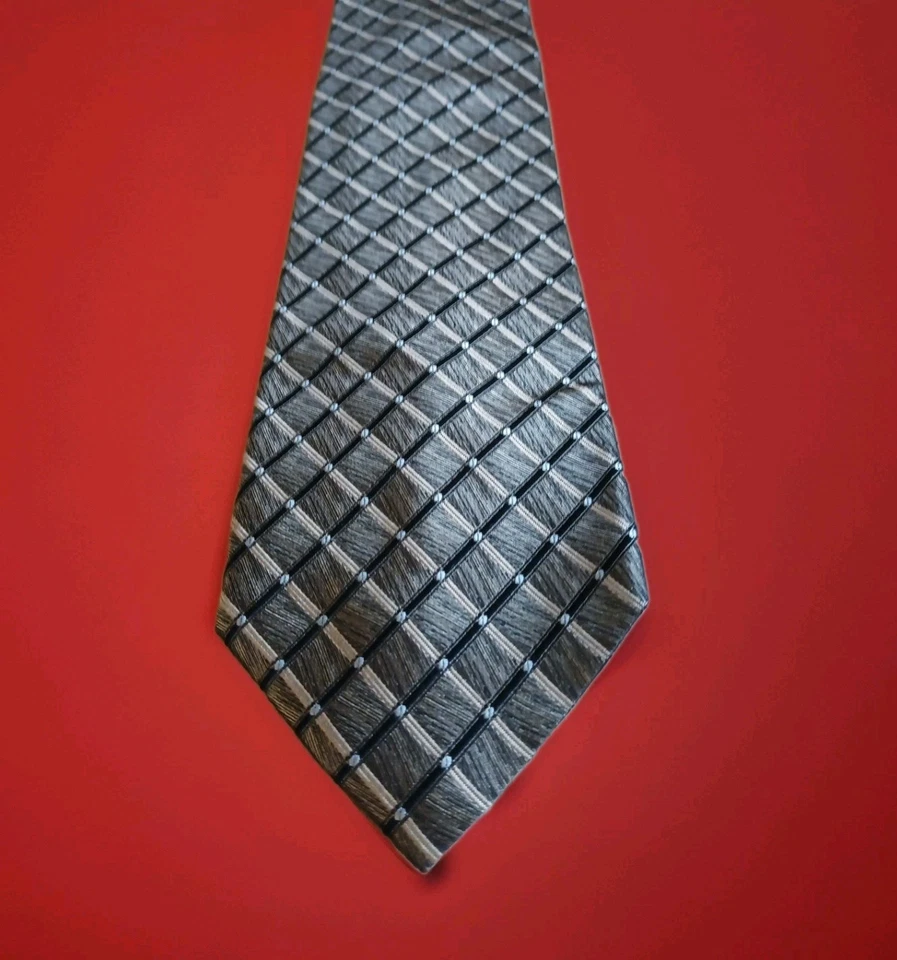 Corbata de seda italiana hecha a mano Valerio Garati dorada y negra texturizada... Foto 4 de 4