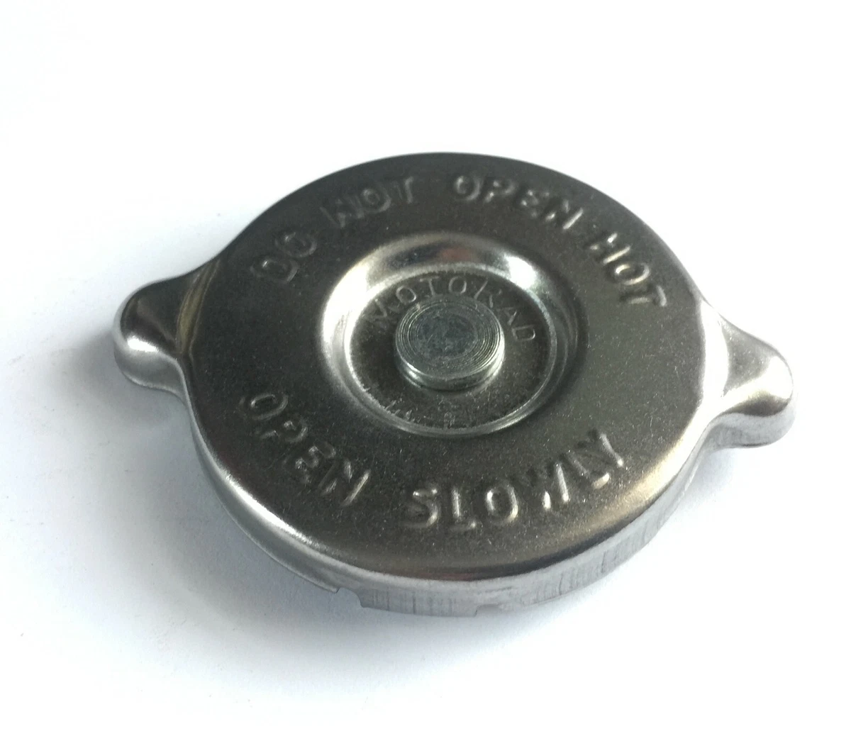 Non pressure outlet radiator cap