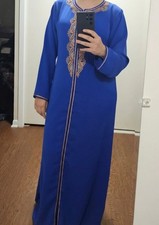 Blue Caftan with delicate rose gold embroidery down the front.
