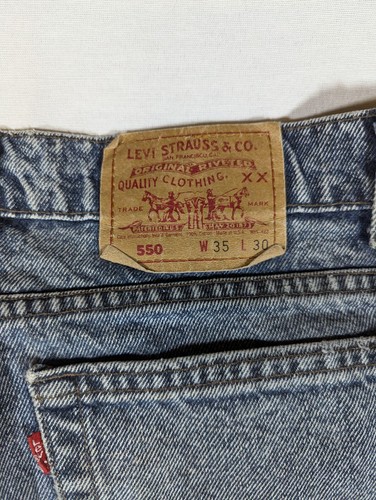 Pantalones de mezclilla vintage Levi's 550 para hombre 35x30 bolsillos lavados a la piedra azul 100 % algodón - Imagen 13 de 13
